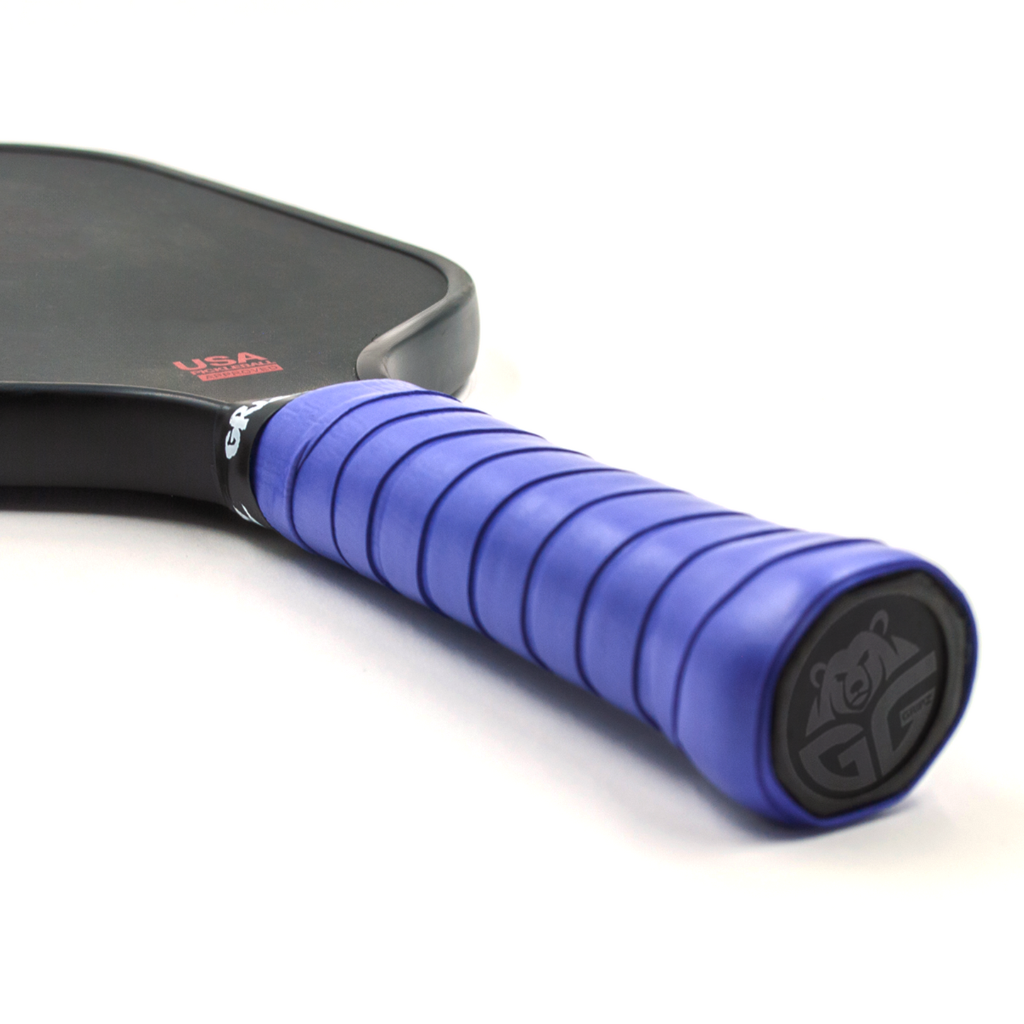 Dark purple Grizzlee Gripz wrapped around a paddle handle - Premium Pickleball Overgrip by Grizzlee Gripz