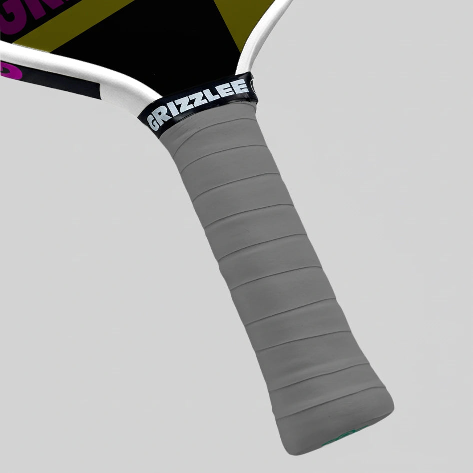 Gray pickleball paddle handle overgrip with 'Grizzlee Gripz' branding on a light gray background