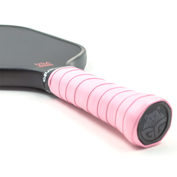 Light Pink Pro Tour Grips - Secondary Image Light pink Grizzlee Gripz wrapped around a paddle handle