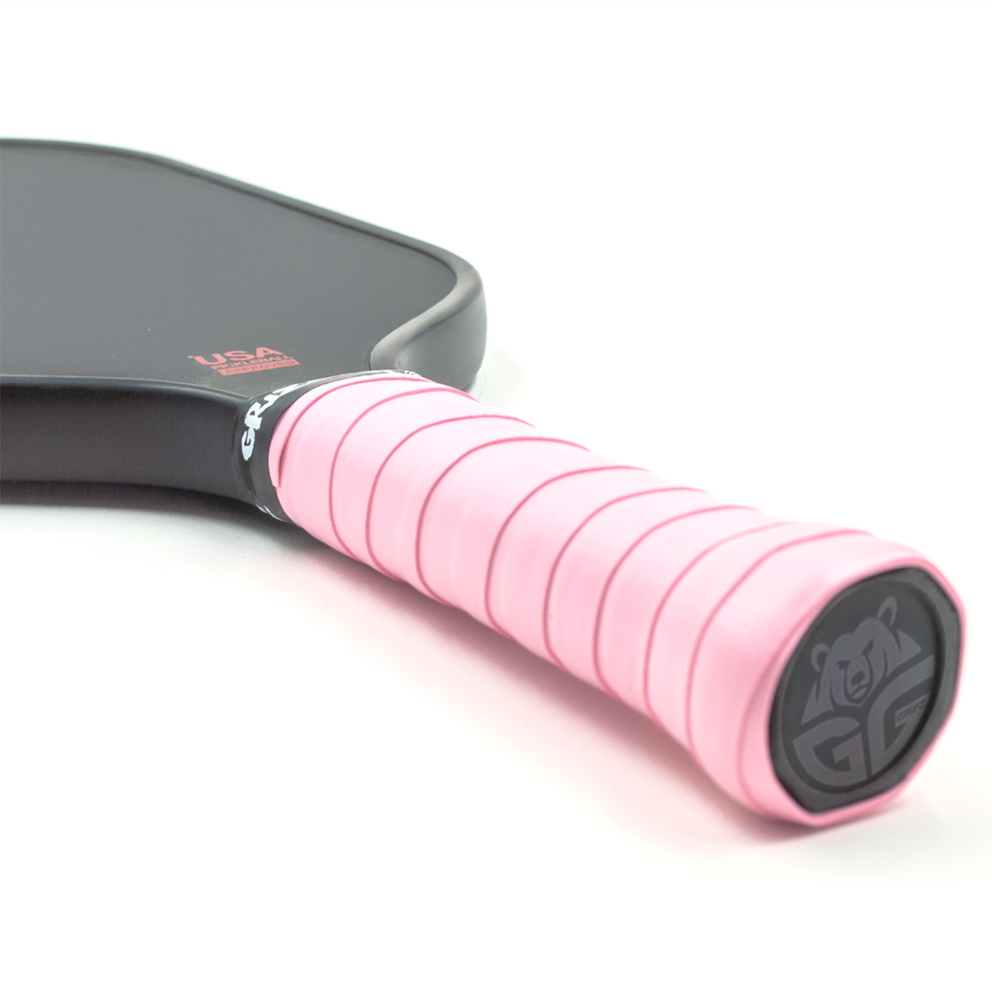 Light pink Grizzlee Gripz wrapped around a paddle handle - Premium Pickleball Overgrip by Grizzlee Gripz