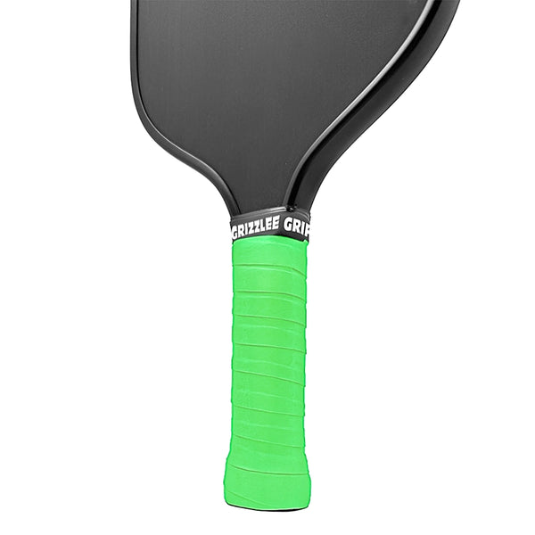Lime Green Pro Tour Grips grizzlee gripz lime green overgrips on a black paddle - quality pickleball over grips useed for tennis, padel, pickleball and badminton