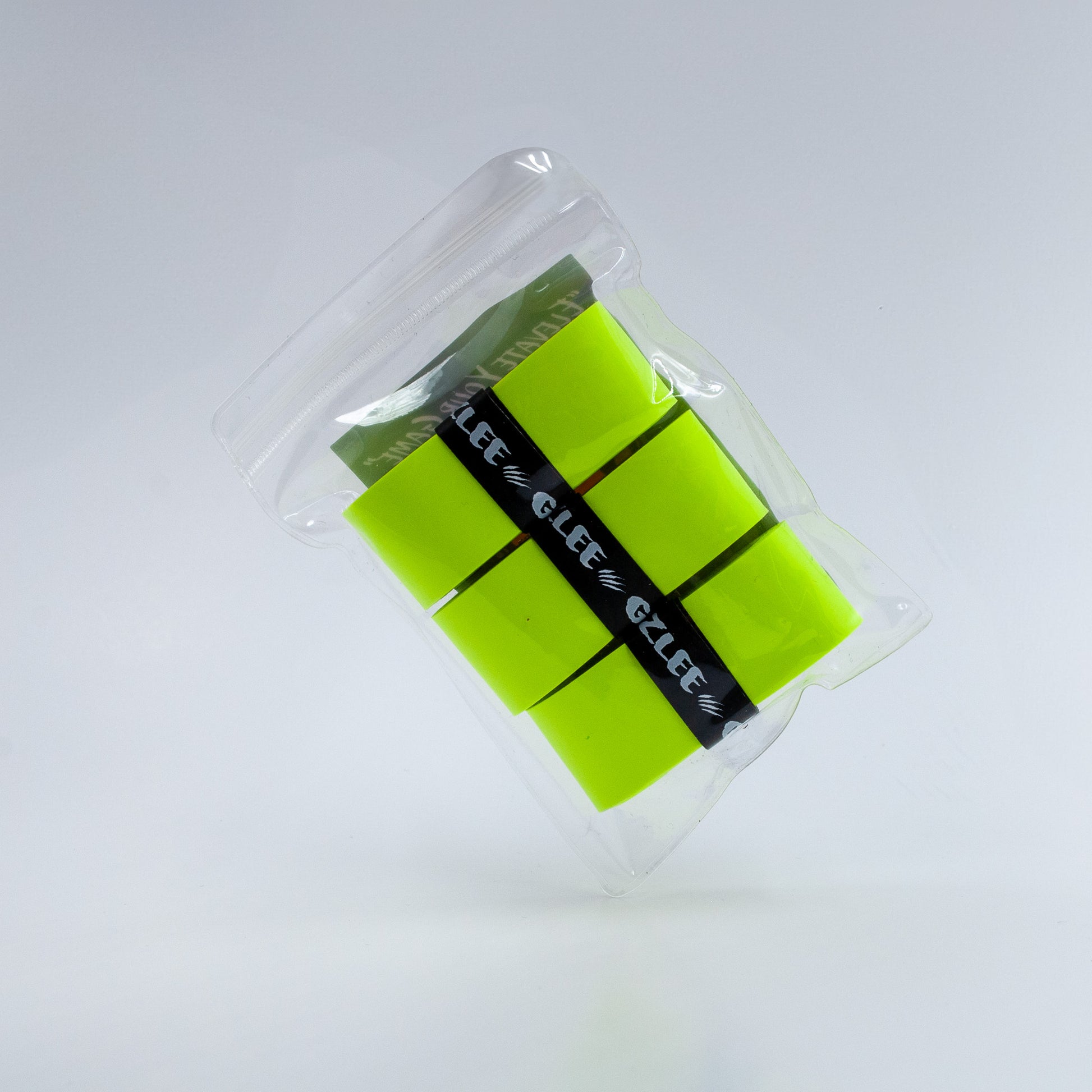 1 pack of 3 Neon Yellow by Grizzlee Gripz portrait style , tilted at an angle highlighting the 3 grips that are in a plastic bag