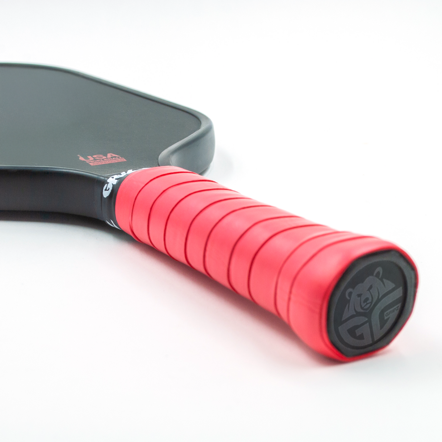 Red Grizzlee Gripz wrapped around a paddle handle - Premium Pickleball Overgrip by Grizzlee Gripz