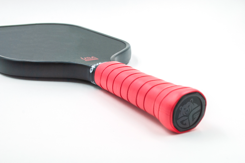 red grizzlee gripz overgrip wrapped on a paddle handle  - Premium Pickleball Overgrip by Grizzlee Gripz