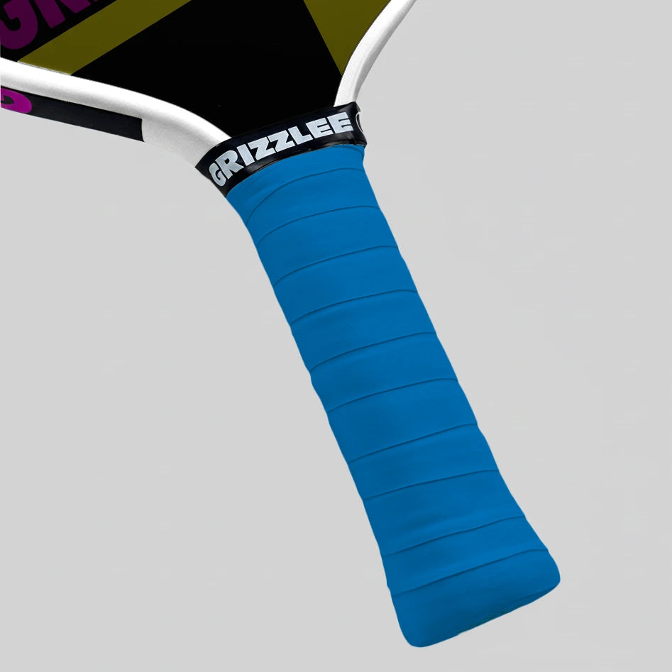 Royal Blue pickleball paddle grip with ''Grizzlee Gripz" branding on a gray background