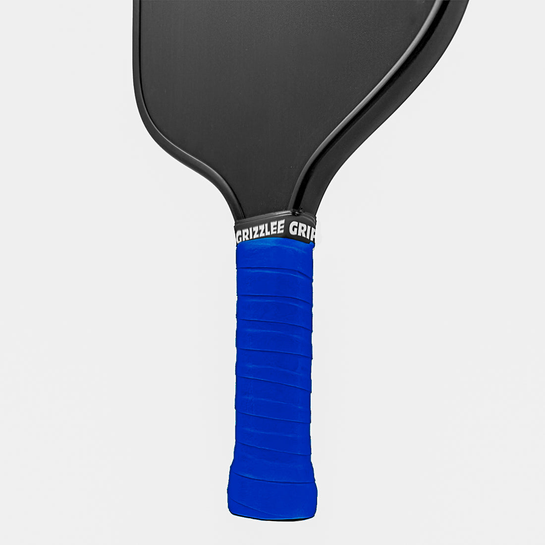 grizzlee gripz royal blue overgrip wrapped around a paddle handle - Premium Pickleball Overgrip by Grizzlee Gripz