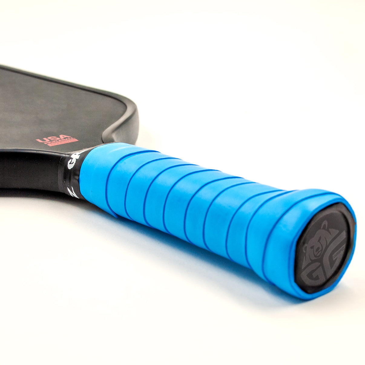 Royal blue Grizzlee Gripz wrapped around a paddle handle - 2025 Performance