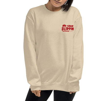 No grip slippin slogan in red on a sand colored sweatshirt